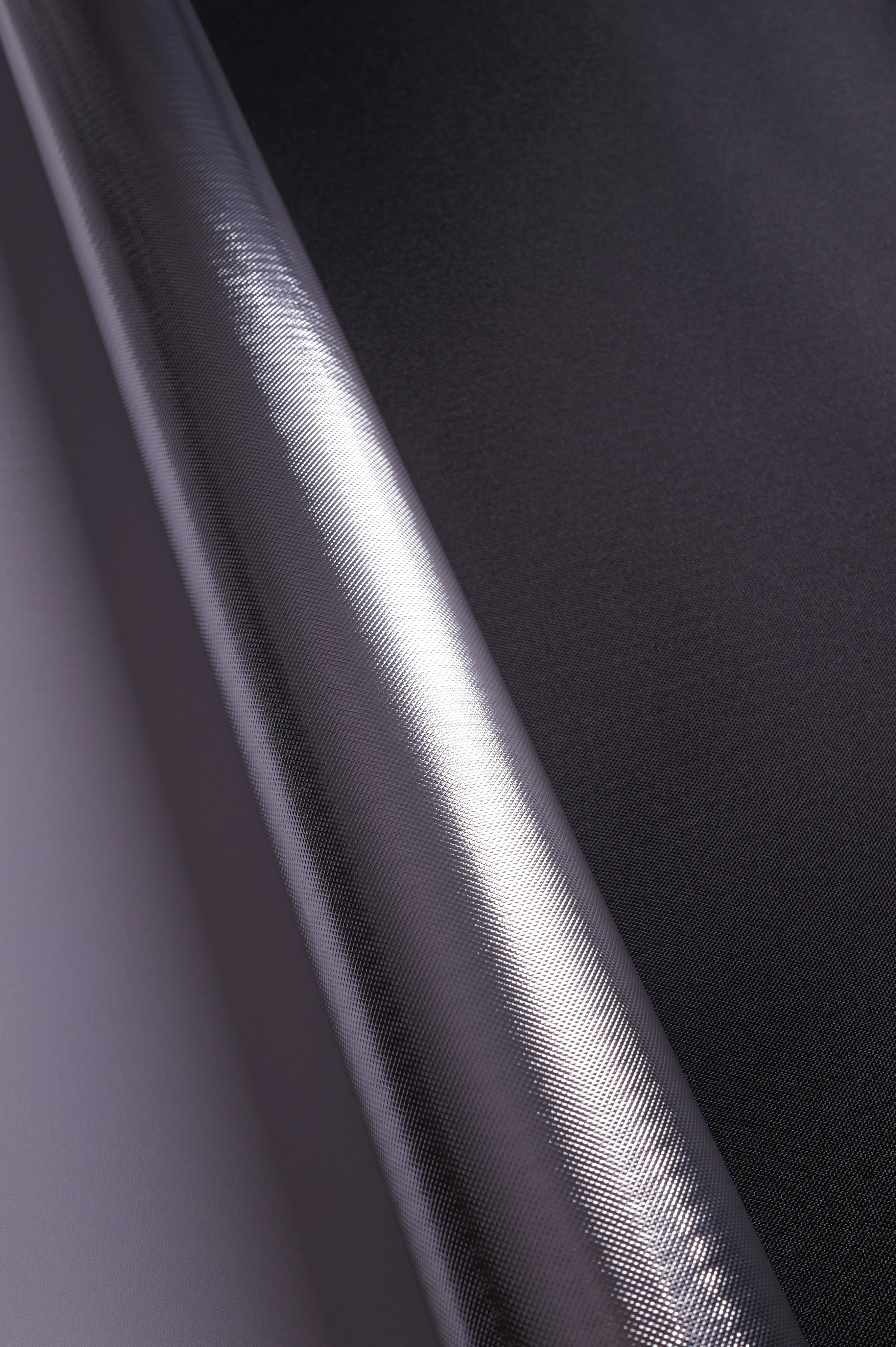 Micro Grid Reflective Laminate, Bright Silver / Black Back – face A