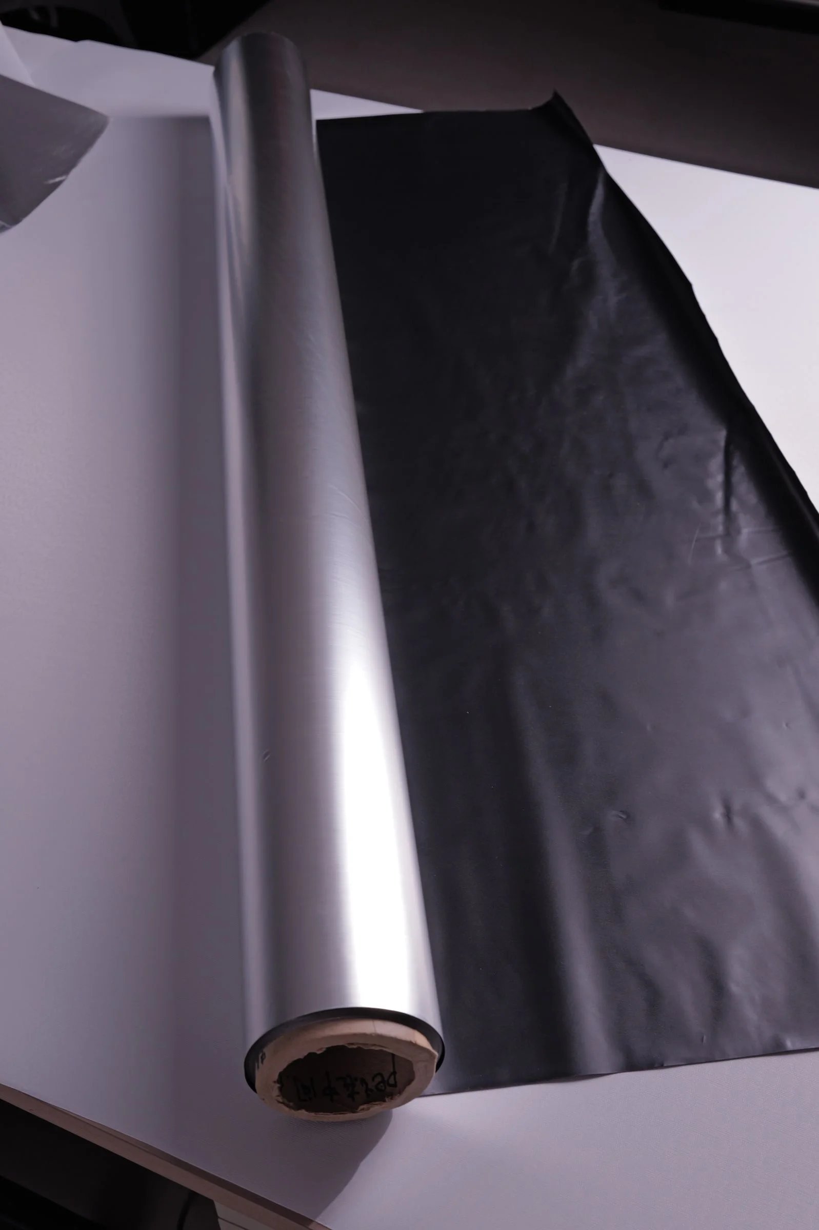 Satin Reflective Laminate, Silver / Black Back – face B