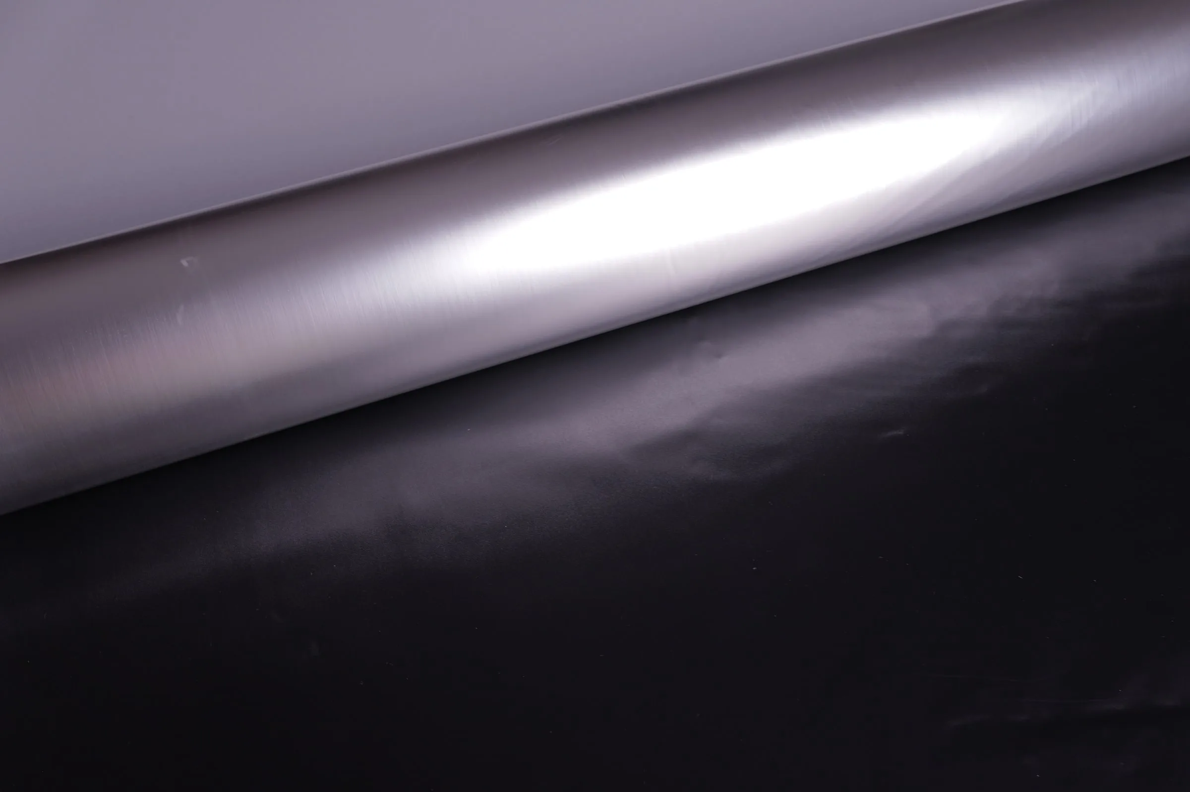 Satin Reflective Laminate, Silver / Black Back – texture close-up