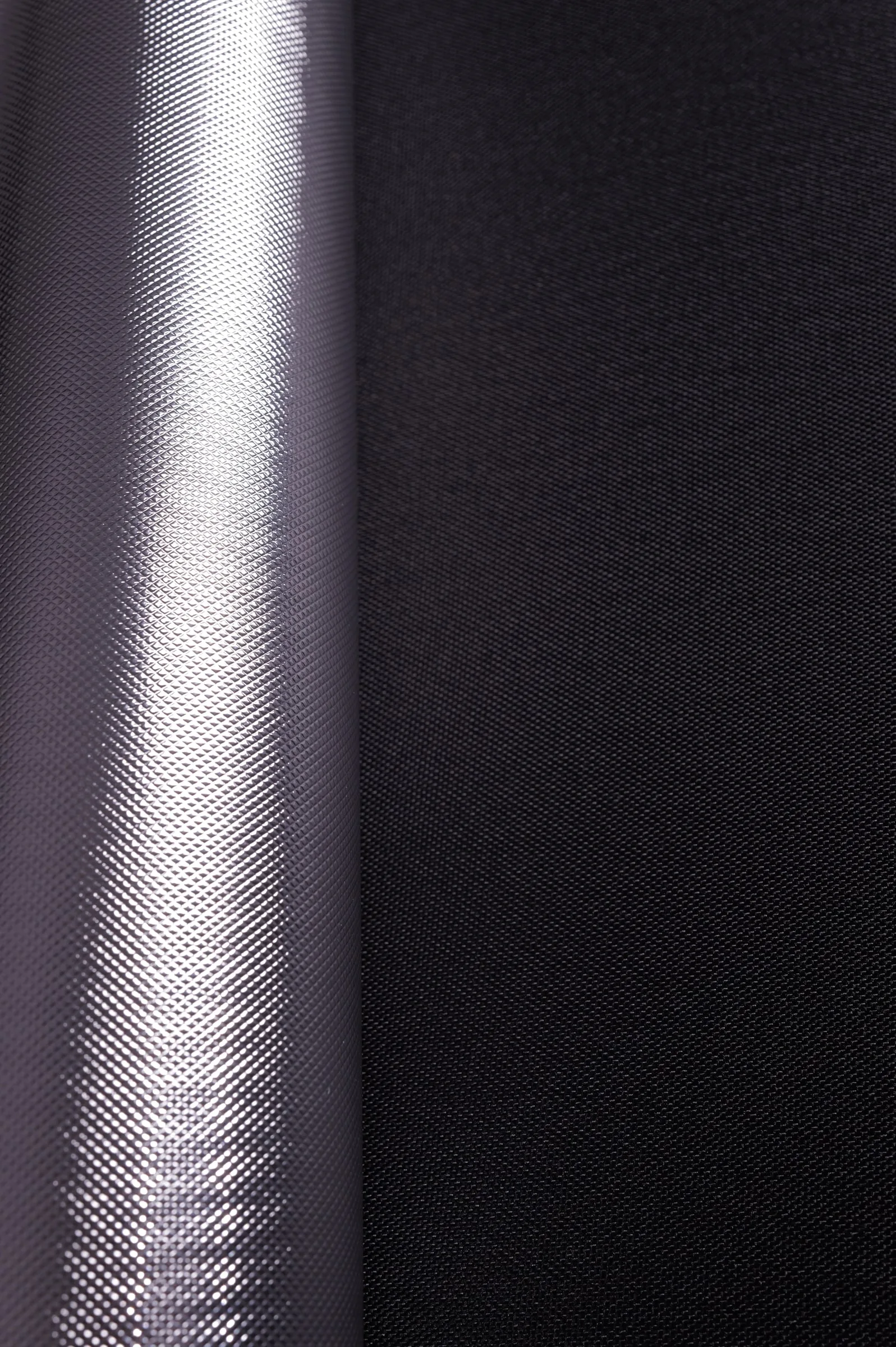 Micro Grid Reflective Laminate, Bright Silver / Black Back – texture close-up
