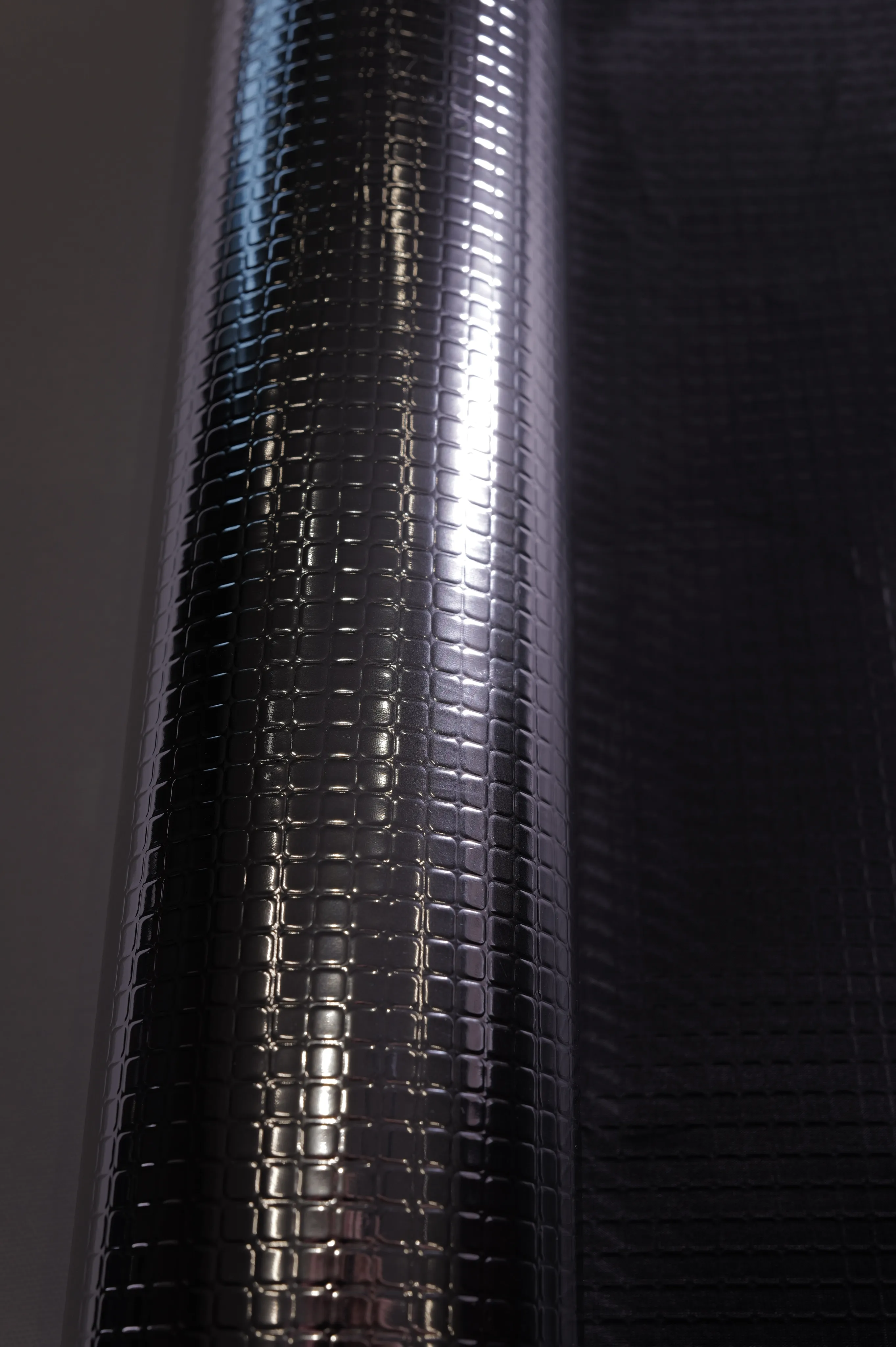 Brick Emboss Reflective Laminate, Gloss Black – texture close-up