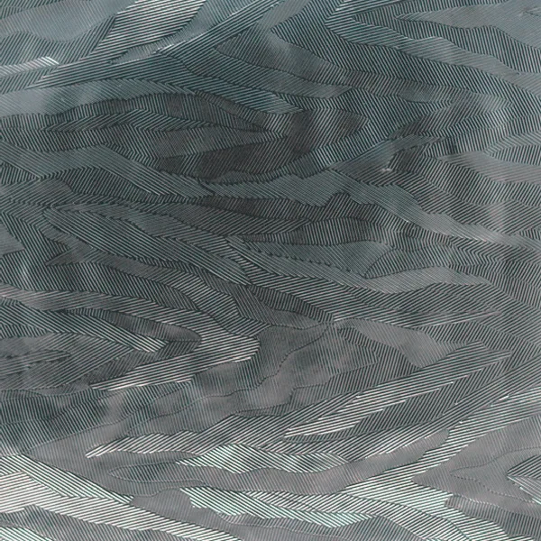 Brushed and feathered pattern on reflective film, macro photograph of sample B0001443