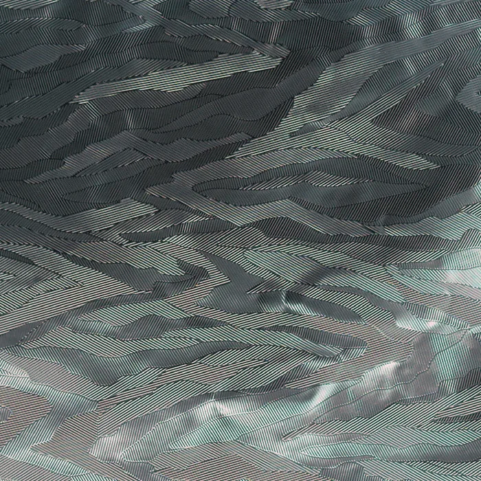 Brushed and feathered pattern on reflective film, macro photograph of sample B0001444