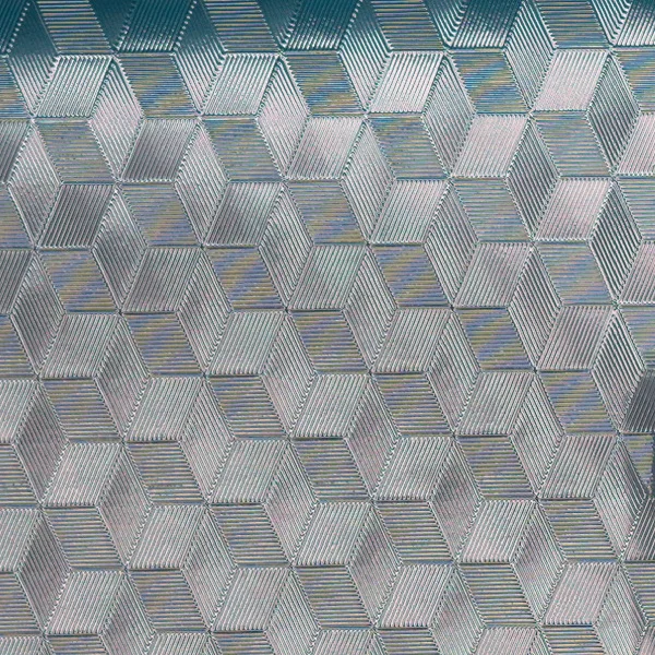 Cube and isometric pattern on reflective film, macro photograph of sample B0001486