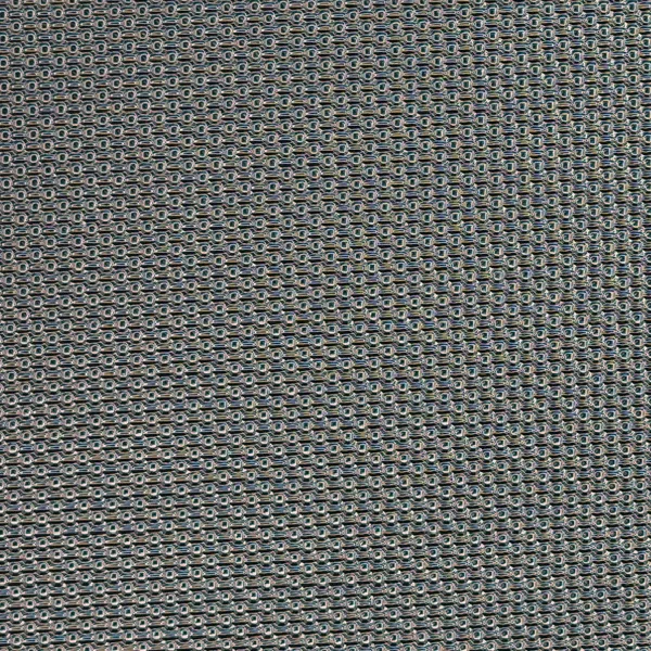 Fine grain and sand pattern on reflective film, macro photograph of sample B0001427