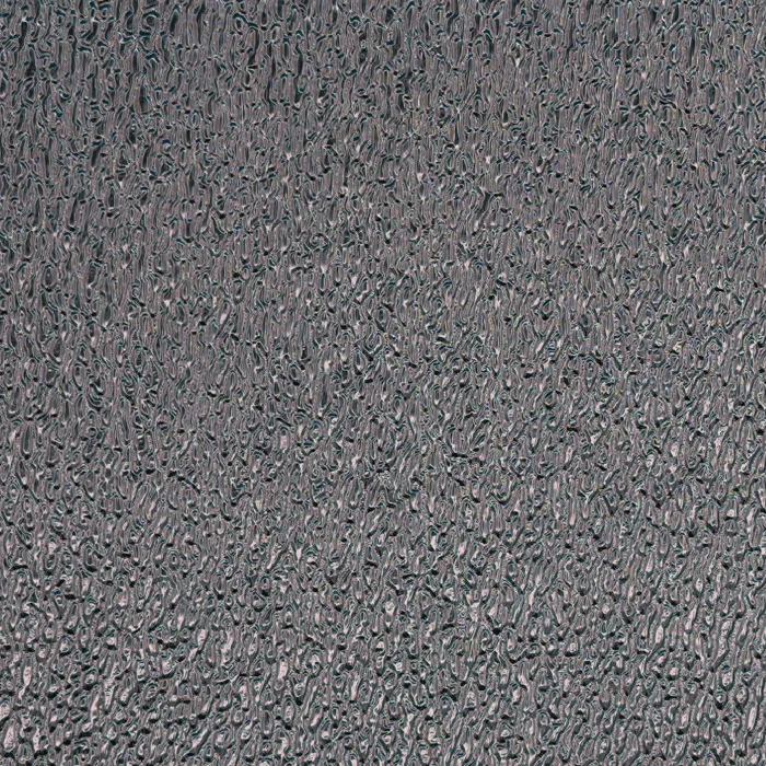 Fine grain and sand pattern on reflective film, macro photograph of sample B0001447