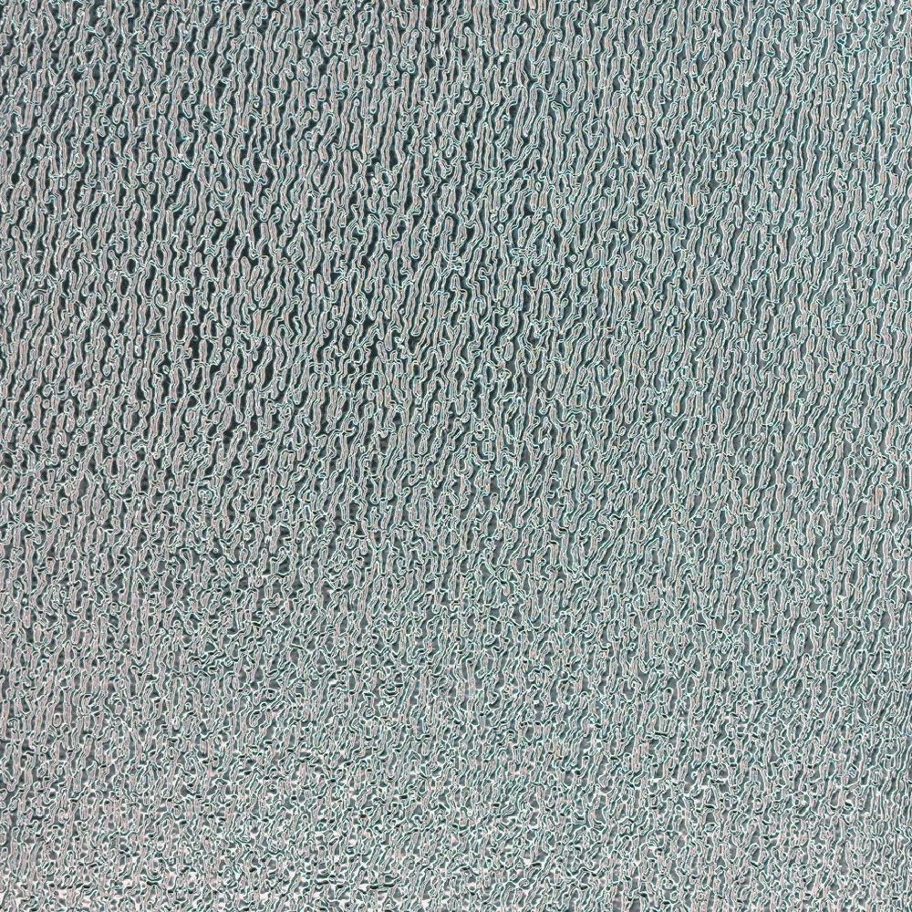 Fine grain and sand pattern on reflective film, macro photograph of sample B0001479