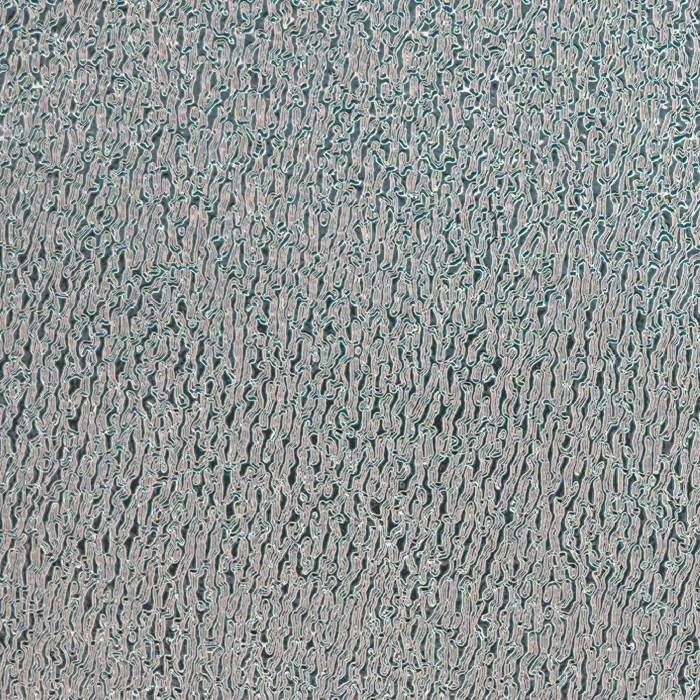 Fine grain and sand pattern on reflective film, macro photograph of sample B0001480