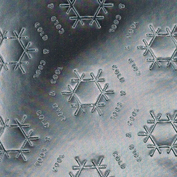 Motif emboss pattern on reflective film, macro photograph of sample B0001414