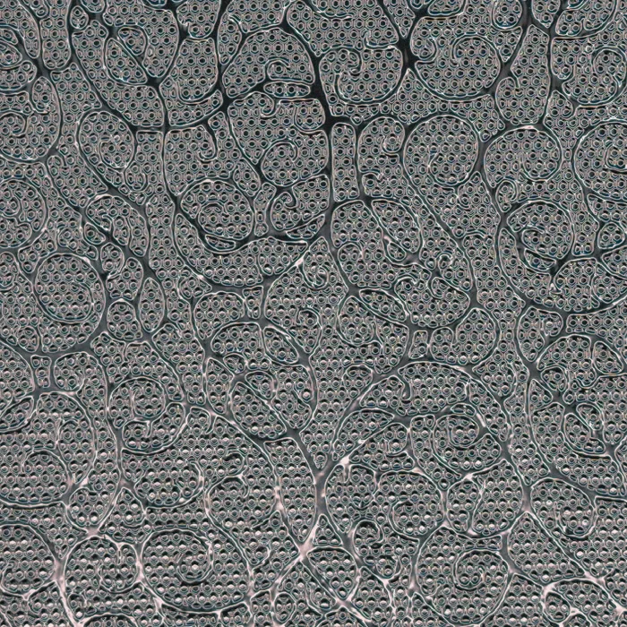 Motif emboss pattern on reflective film, macro photograph of sample B0001434