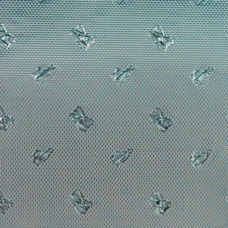 Motif emboss pattern on reflective film, macro photograph of sample B0001488