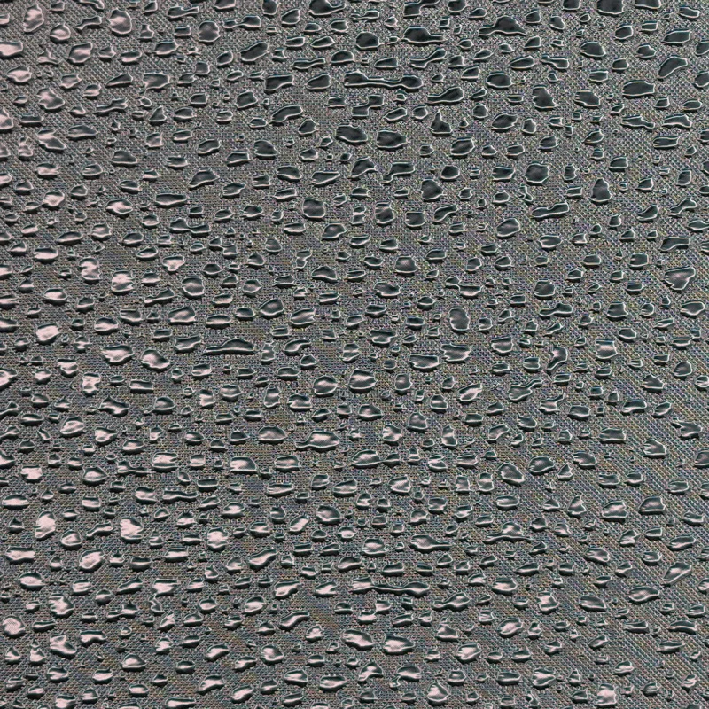 Pebble and droplet pattern on reflective film, macro photograph of sample B0001454