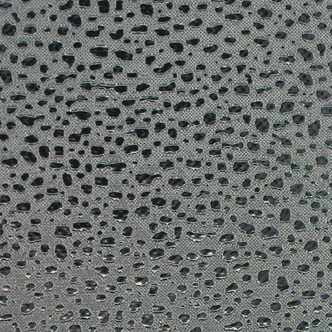 Pebble and droplet pattern on reflective film, macro photograph of sample B0001467