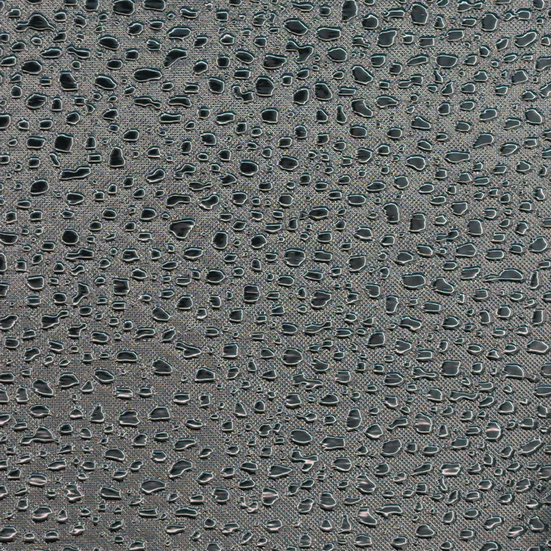 Pebble and droplet pattern on reflective film, macro photograph of sample B0001468