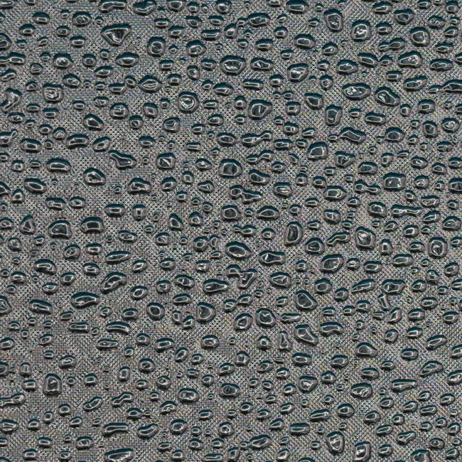 Pebble and droplet pattern on reflective film, macro photograph of sample B0001474