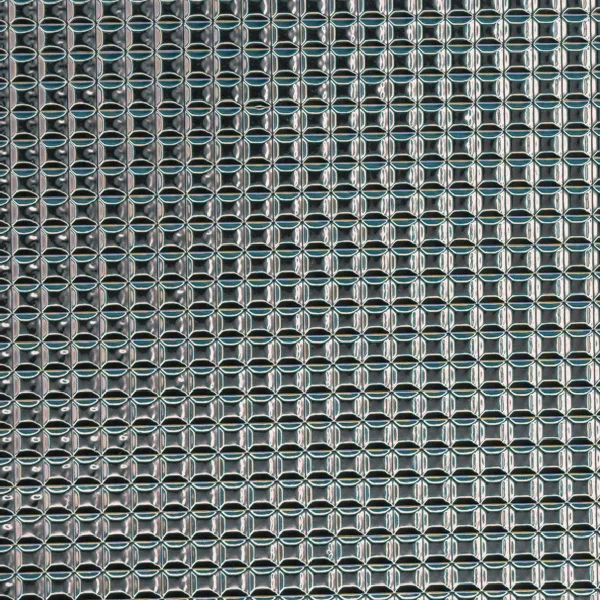 Grid and woven pattern on reflective film, macro photograph of sample B0001413