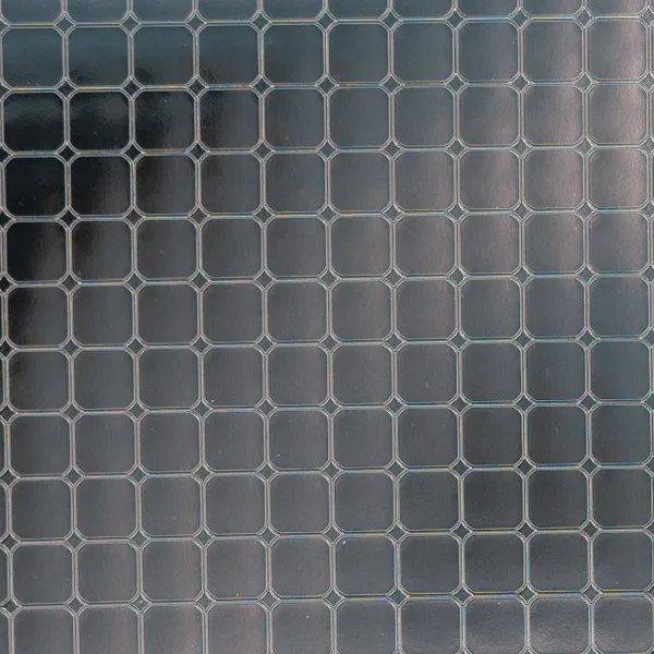 Grid and woven pattern on reflective film, macro photograph of sample B0001442