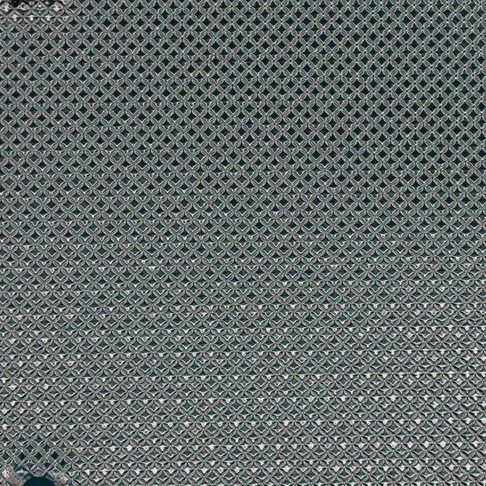 Grid and woven pattern on reflective film, macro photograph of sample B0001455