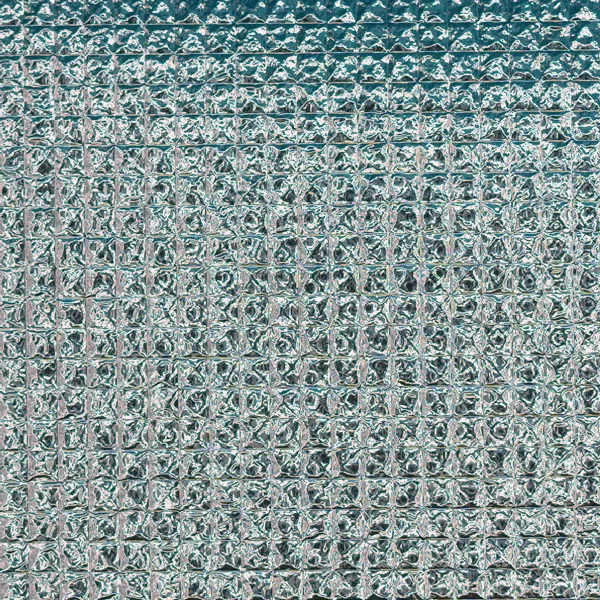 Grid and woven pattern on reflective film, macro photograph of sample B0001473